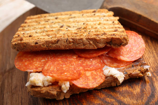 istock Crunchy toast with lard and pepperoni salami 1994860365