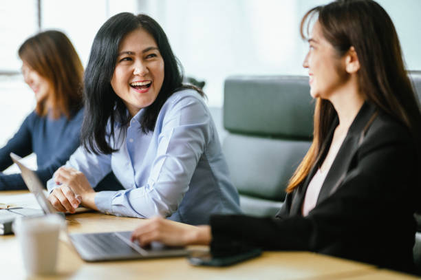 istock Asian Business Minds Unite: Collaborative Strategy Session in Co-working Office 1994894118
