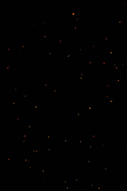 bonfire spark in the dark sky in night, shallow focus