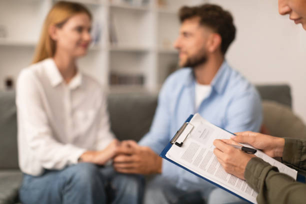 istock Psychotherapist takes notes on tablet during successful counseling session indoor 1994912449