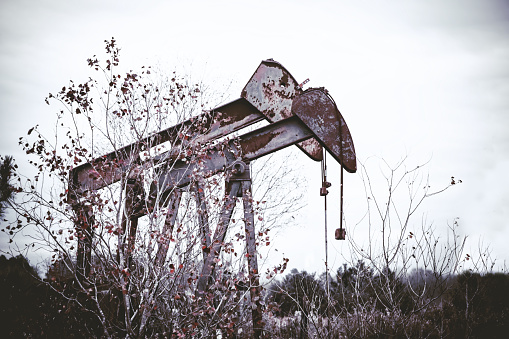 An old pumpjack, sometimes called a grasshopper oil pump somewhere in Texas