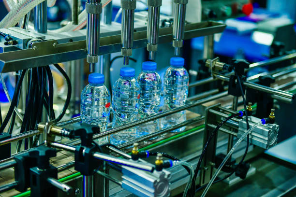 Clear plastic Bottles transfer on Automated conveyor systems industrial