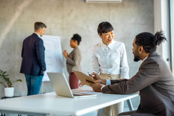 istock Coworkers having a discussion in the office 1994968502