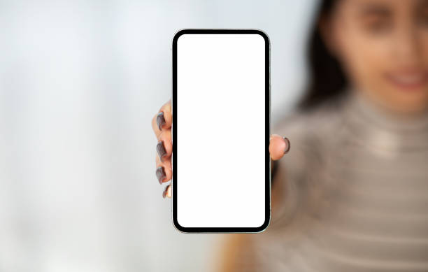 istock Millennial arab lady show smartphone with empty screen, for chatting 1994971261