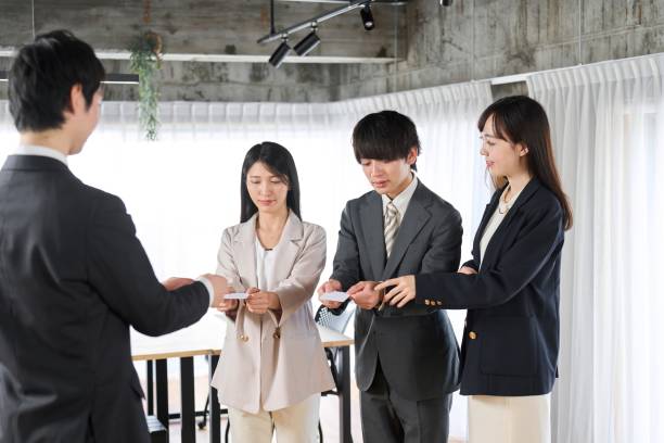 istock Business people conducting etiquette training 1994989528