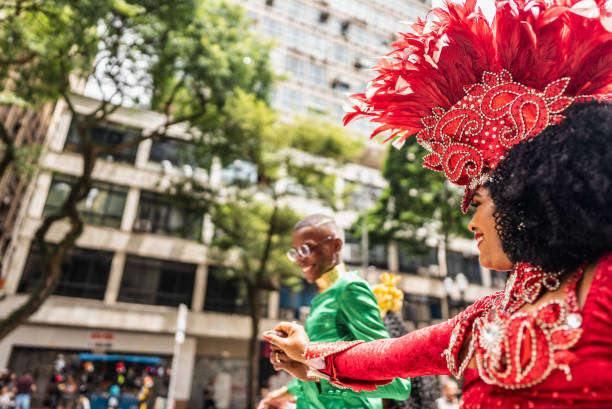 Young man dancing at a street carnival party