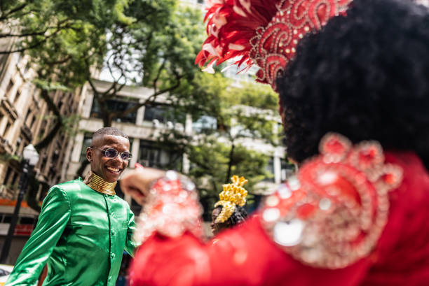 istock Young man dancing at a street carnival party 1994989551