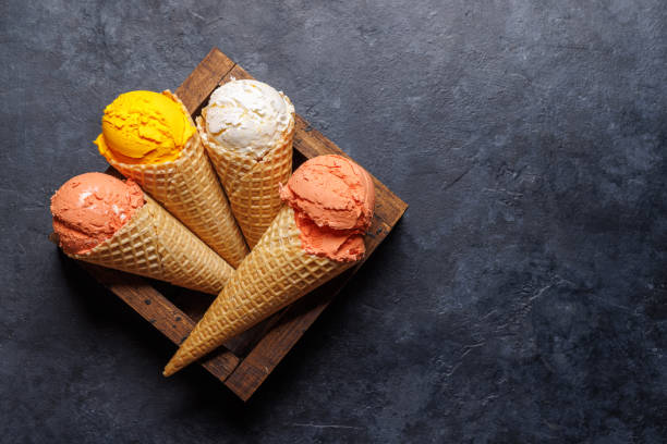 istock Assorted ice cream flavours in delightful waffle cones 1994994315