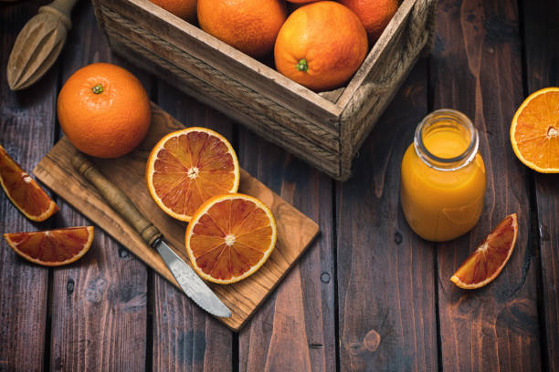 istock Freshly squeezed juice of blood oranges 1995008076