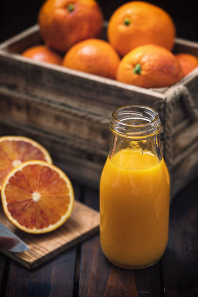 istock Freshly squeezed juice of blood oranges 1995008084