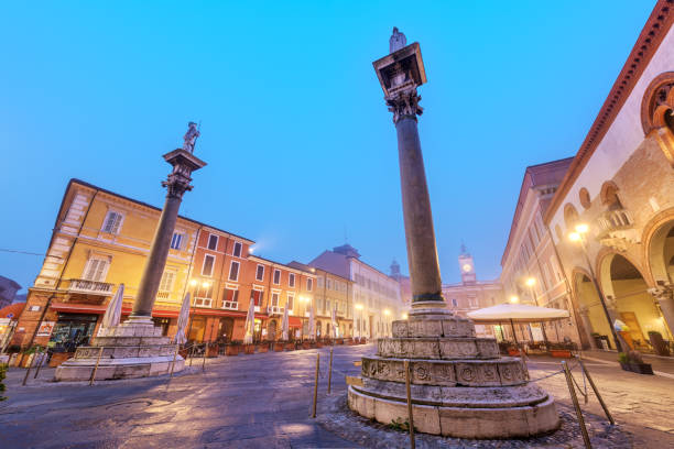 Ravenna, Italy at Piazza del Popolo with the landmark Venetian columns at dusk.