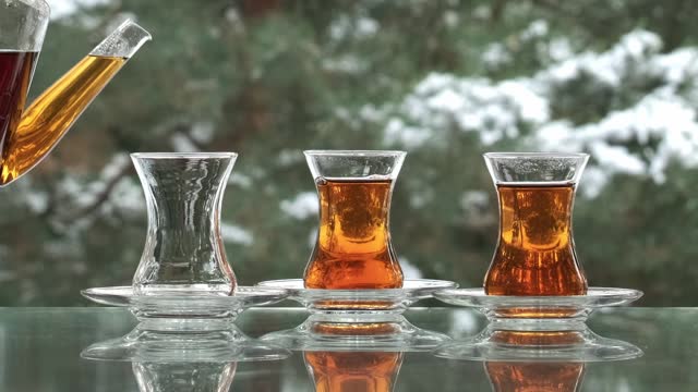 Turkish tea in cup in wintertime outdoors