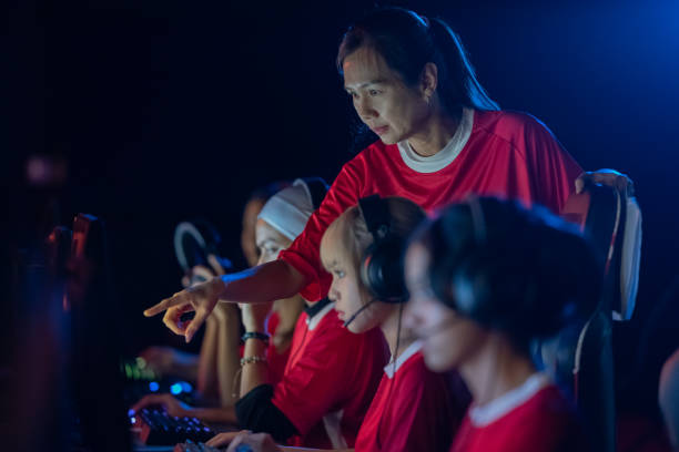 istock Asian female team esport player playing practice game 1995040383