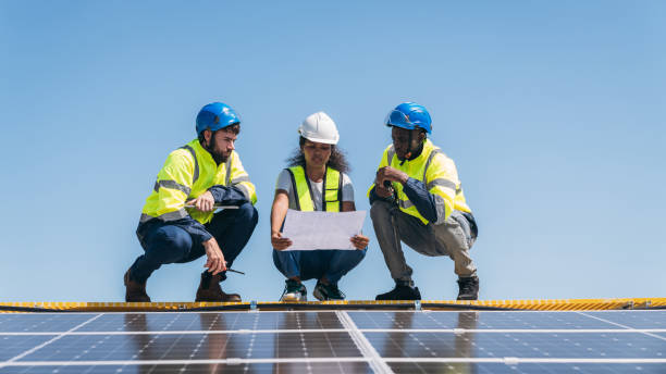 istock Service engineer checking solar cell on the roof for maintenance if there is a damaged part. Engineer worker install solar panel. Clean energy concept. 1995096293