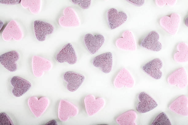 Colorful sugar sprinkles on white background