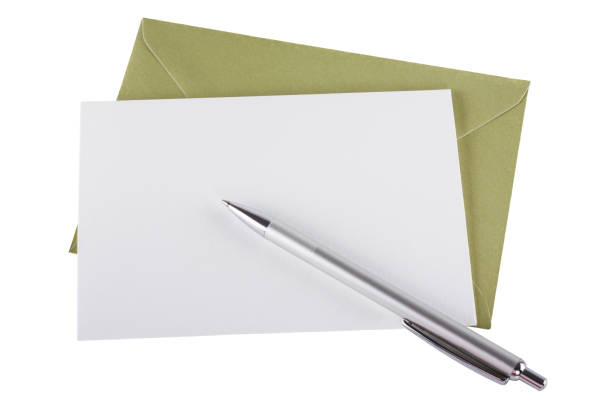 Green envelope, blank invitation cart and pen isotlated white background