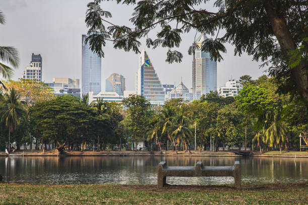 istock stone bench and bangkok city buildings views 1995117400