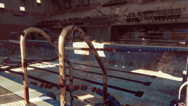An abandoned swimming pool devoid of any swimmers or activity