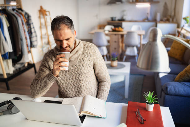 istock Mature Caucasian man working at his home office 1995153458