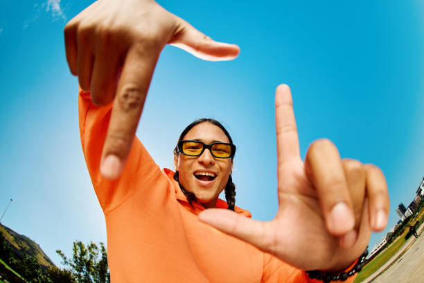 istock Generation Z Teenage Boy Looking down at the camera, shot wide angle. 1995160640