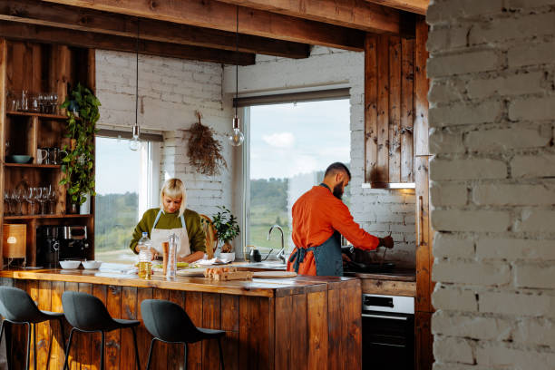 istock Young couple cooking at home. 1995168144