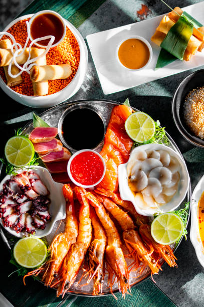 Set Seafood with salmon fish, tuna, shrimp, caviar on plate