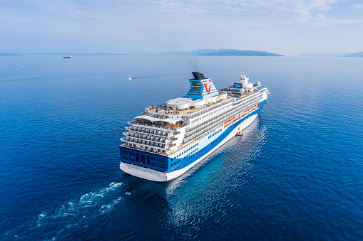Rijeka, Croatia - June 5, 2022: Cruiser sails from port of Rijeka