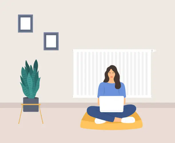 Vector illustration of Young Woman With Laptop Sitting On The Floor In Front Of Radiator. Working At Home. Living Room Interior With Radiator Heater And Potted Plant. Cold Temperature In The House