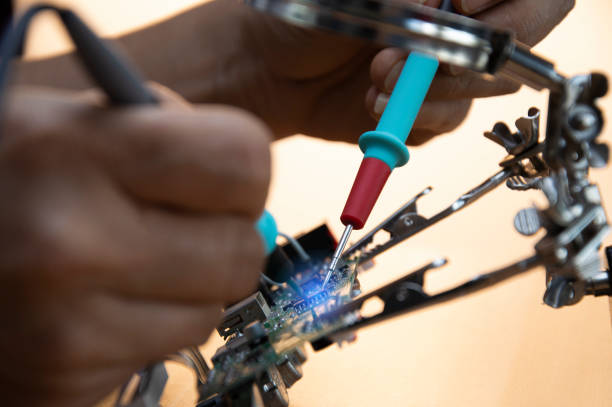 istock Technicians are repairing motherboards and checking electrical currents, repairing circuits 1995223822