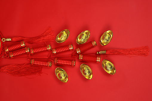 Chinese New Year ornament with cracker and Gold ingot Chinese text language means blessing Wealthy and good luck