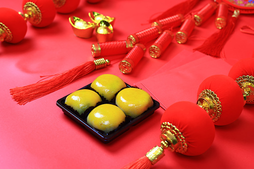 Chinese New Year ornament with spring roll and Gold ingot, blessing Wealthy, and good luck