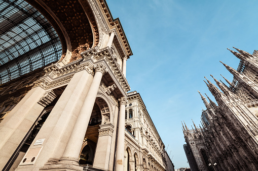 Gallerie Vittorio Emanuele II On Left And Duomo On The Right In Milan, Italy.