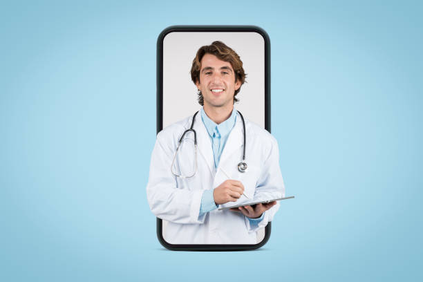 istock Cheerful male doctor with tablet inside smartphone frame 1995242471