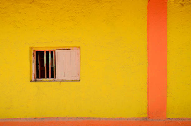Blue door in yellow building.