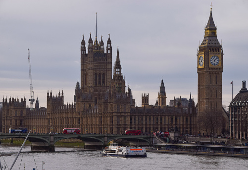 London, UK - January 20 2024: daytime view of the Houses of Parliament,  Big Ben, Westminster Bridge and River Thames.