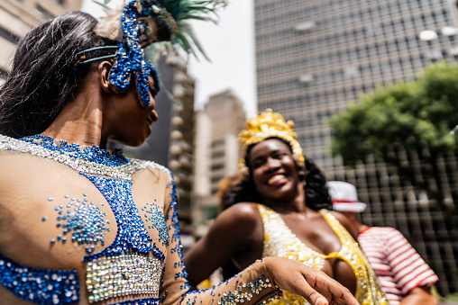 Women dancing at a street carnival party