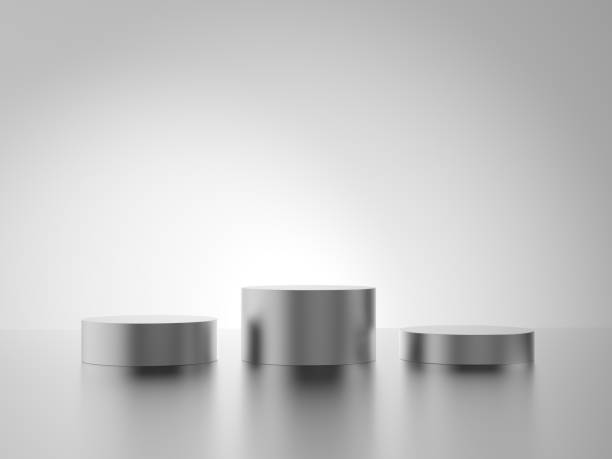 istock Podium. Cylinder. Gray background. Metallic. 1995298062
