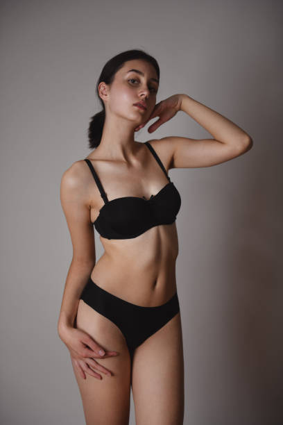 istock Prideful Pose By Female In Black Underwear 1995303327