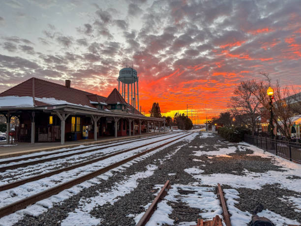 Manassas, Virginia Amtrak and VRE station in the snow under a winter sunset