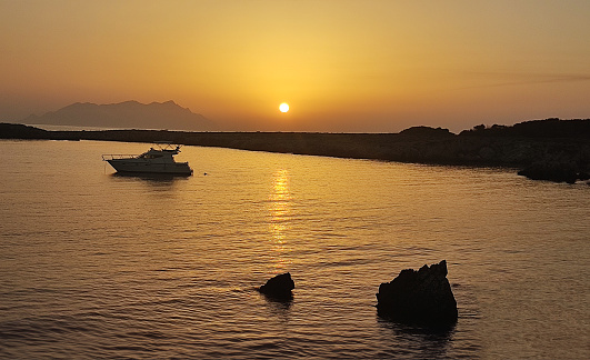 romantic sunset at Cala Rotonda in Favignana, Egadi islands, Sicily