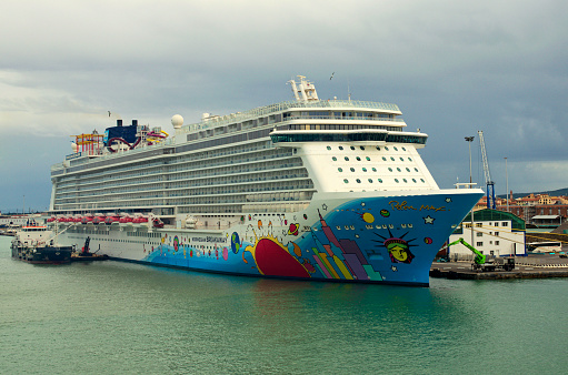 Livorno, Italy-November 01,2023:Luxury cruise linear NCL Norwegian Breakaway docked in port of Livorno. International water transport. Travel and tourism concept.
