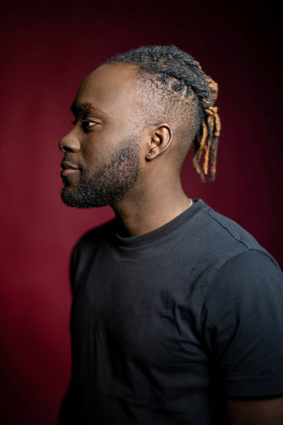 istock Side view of handsome young african man with afro hairstyle 1995368341