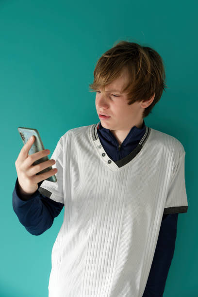 istock Teenager with cell phone. 1995389949
