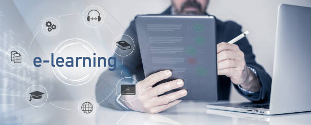 istock Man do online exam on virtual screen. Answer a survey filling out a tech form. Quiz, test concept 1995427435
