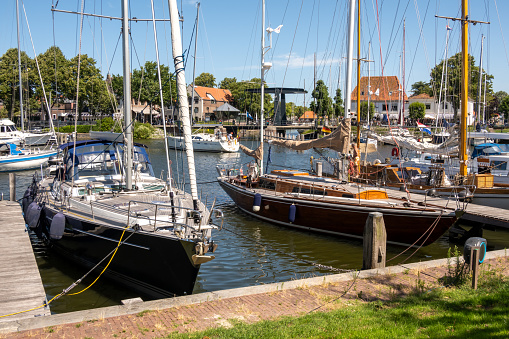 Sailboats in marina Westerhaven in city of Medemblik, Noord-Holland, Netherlands
