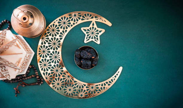 istock Ramadan Mubarak greeting poster image, Flatly image of crescent moon and lantern lamp 1995450736