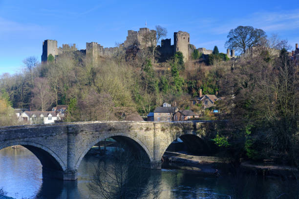 Ludlow Castle, Shropshire, UK Ludlow, UK - January 19 2024: Ludlow Castle  in Shropshire viewed across the River Teme ludlow shropshire stock pictures, royalty-free photos & images