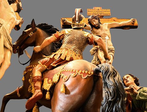 Polychrome wood carvings of the Calvary of Christ with the spear that will be stuck in his chest. These wooden carvings go out in procession during Holy Week in Zamora, Spain.