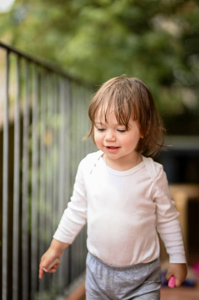 istock Toddler girl playing portrait. 1995570915