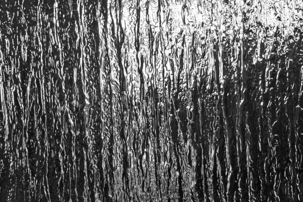 istock Vertical pattern in the form of water in the glass 1995606300